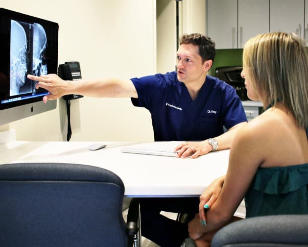 dr. frey helping patient