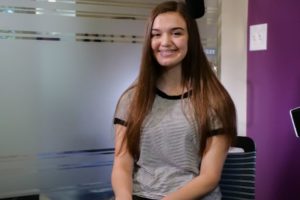teen smiling with braces on