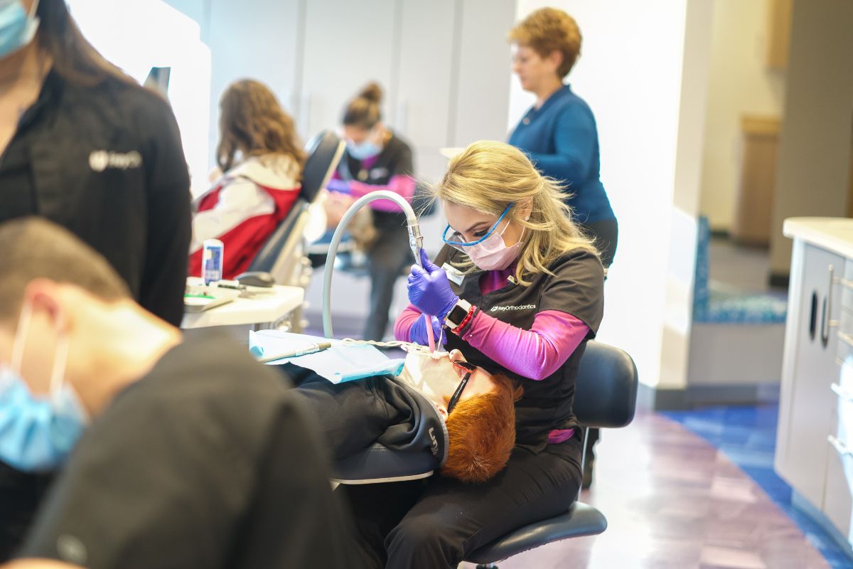 Frey Orthodontics assistant working on a patient's teeth